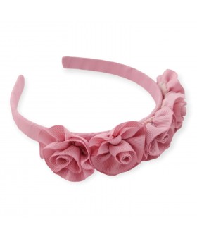 Tocado cinco flores rosa...